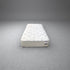 Twin XL Breeze Cool Max 10" Medium Firm Tight top mattress on a concrete background
